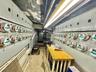 Utility room featuring electric meter and electric panel