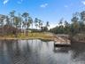 Recently renovated private dock offering boating,fishing, sunset views and peaceful lakefront living.