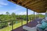 Covered balcony/deck from 2nd level-Primary and 3rd bedroom access