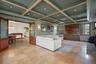 Bright, large family room with FPLC and outdoor access to private balcony and yard