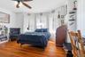 Thoughtfully proportioned with hardwood floors and room for a desk, creating the perfect blend of comfort and functionality.