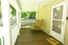 Front porch with custom swing to enjoy any time of the day or evening.