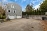 View of home's exterior featuring driveway and an attached garage