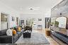 Family Room light and bright with amazing fireplace!