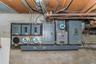 Utility room featuring electric panel