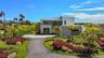 Nestled on a quiet cul-de-sac and offered fully furnished, this exceptional two-story residence combines elegant design, resort-style amenities, and c