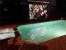Watch TV And Movies On The Poolside Theater