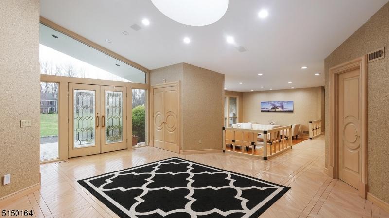 High Ceiling foyer & Skylight