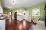 Dining/sitting area w/access to back staircase