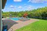 Beyond the pool deck you will find plenty of green space for kids and pets not to mention the view of the lush green preserve.