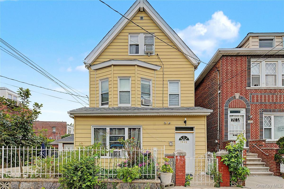 Welcome to 1913 Bogart Avenue — a spacious three-family home offering approximately 3,304 square feet of living space on an oversized approximately 5,