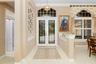 Foyer with herringbone tile inlaid
