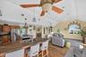 shows open layout; living room and dining room