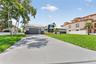 Spacious parking pad just painted & re-sealed with plenty of room for guests, boats, or an RV.