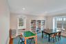 Dining space featuring dark wood-type flooring