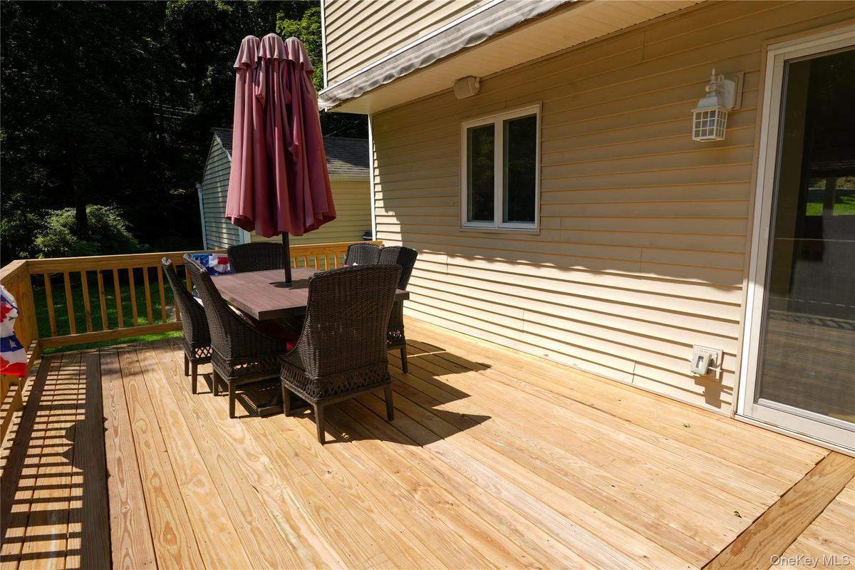 Brand-new custom deck to enjoy overlooking the backyard