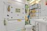 Guest Bathroom w/ jetted soaking tub and Jack & Jill access for Bedroom 2 and hallway entrance.