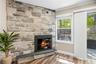 Beautiful stone wood burning fireplace