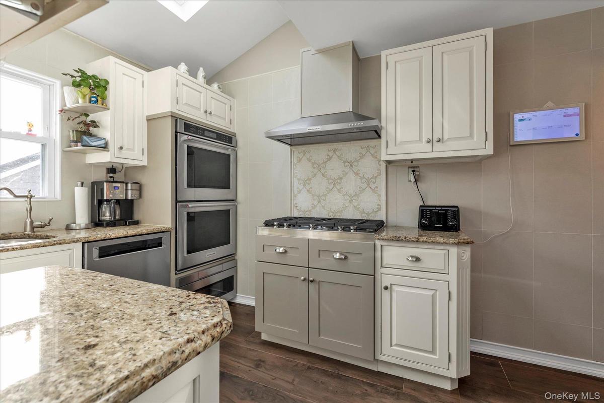 Fully Renovated Kitchen With SS Appliances, Skylight, Radiant Flooring