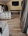 From dining room entering kitchen