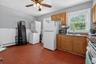 Eat-in kitchen complete with in unit washer and dryer.