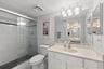 Tiled Walk-In Shower & Second Vanity