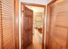 Clothes Closet on the left and a washer and dryer in the right closet