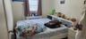 Bedroom with radiator and cooling unit