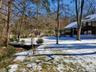 View of yard layered in snow