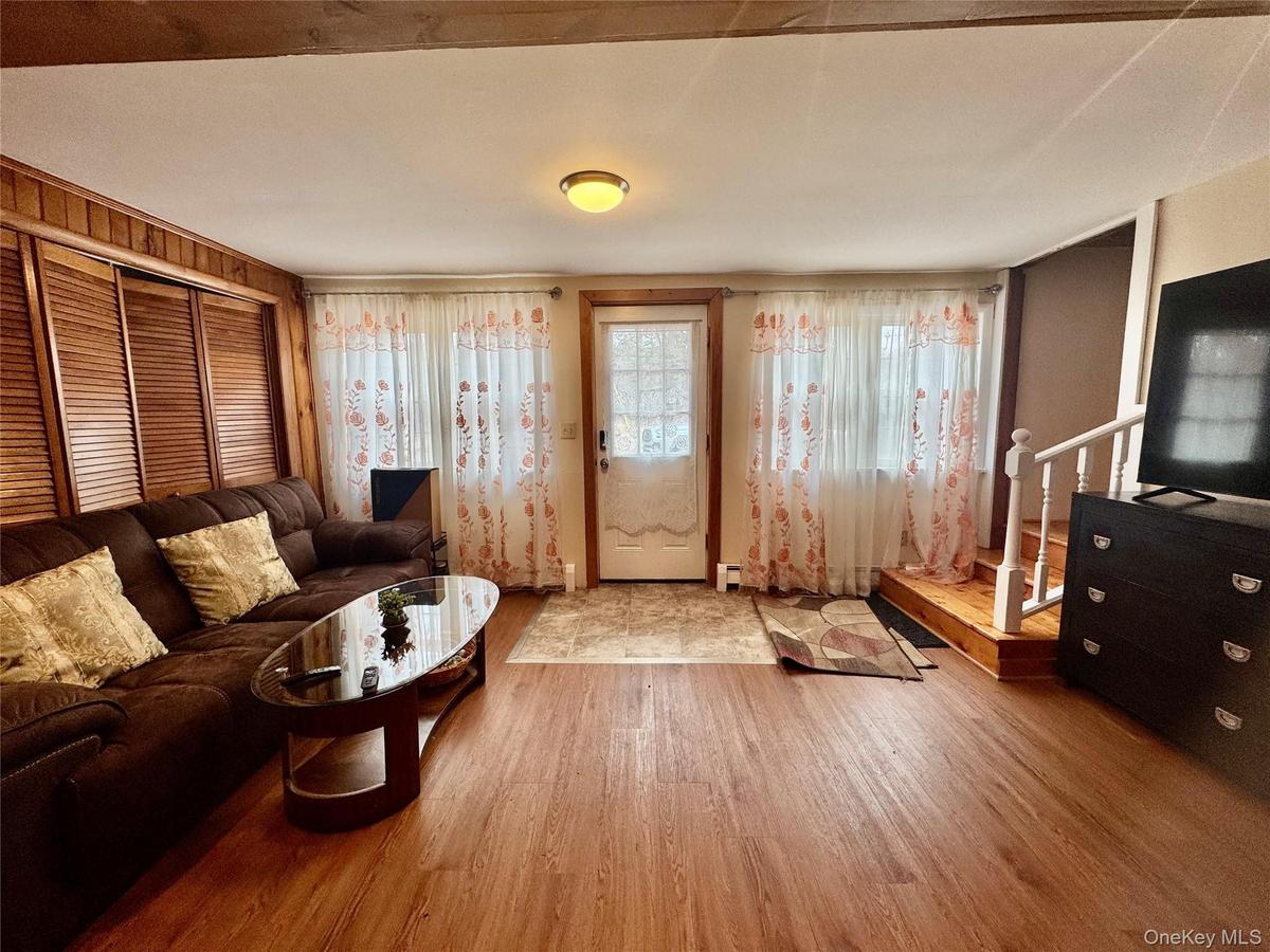 1 - Living room with wood finished floors