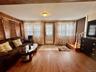 1 - Living room with wood finished floors