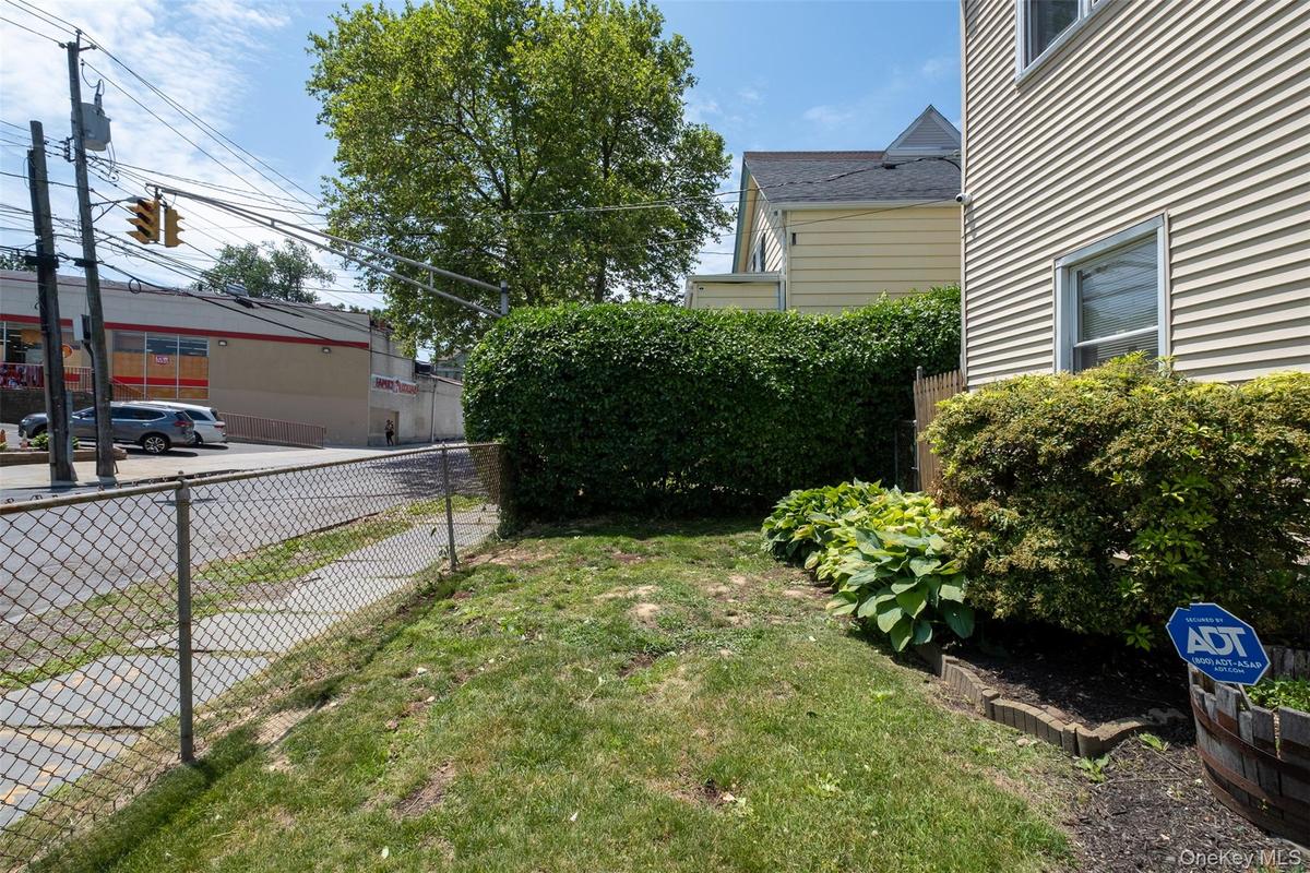 the front yard grass area