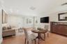 Downstairs In-law suite with private entrance- Kitchen/Living area - STAGED