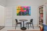 Dining area featuring hardwood / wood-style flooring and baseboards