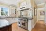 Stunning Gourmet Kitchen with enormous island, subzero fridge, 48" Dacor Gas Stove