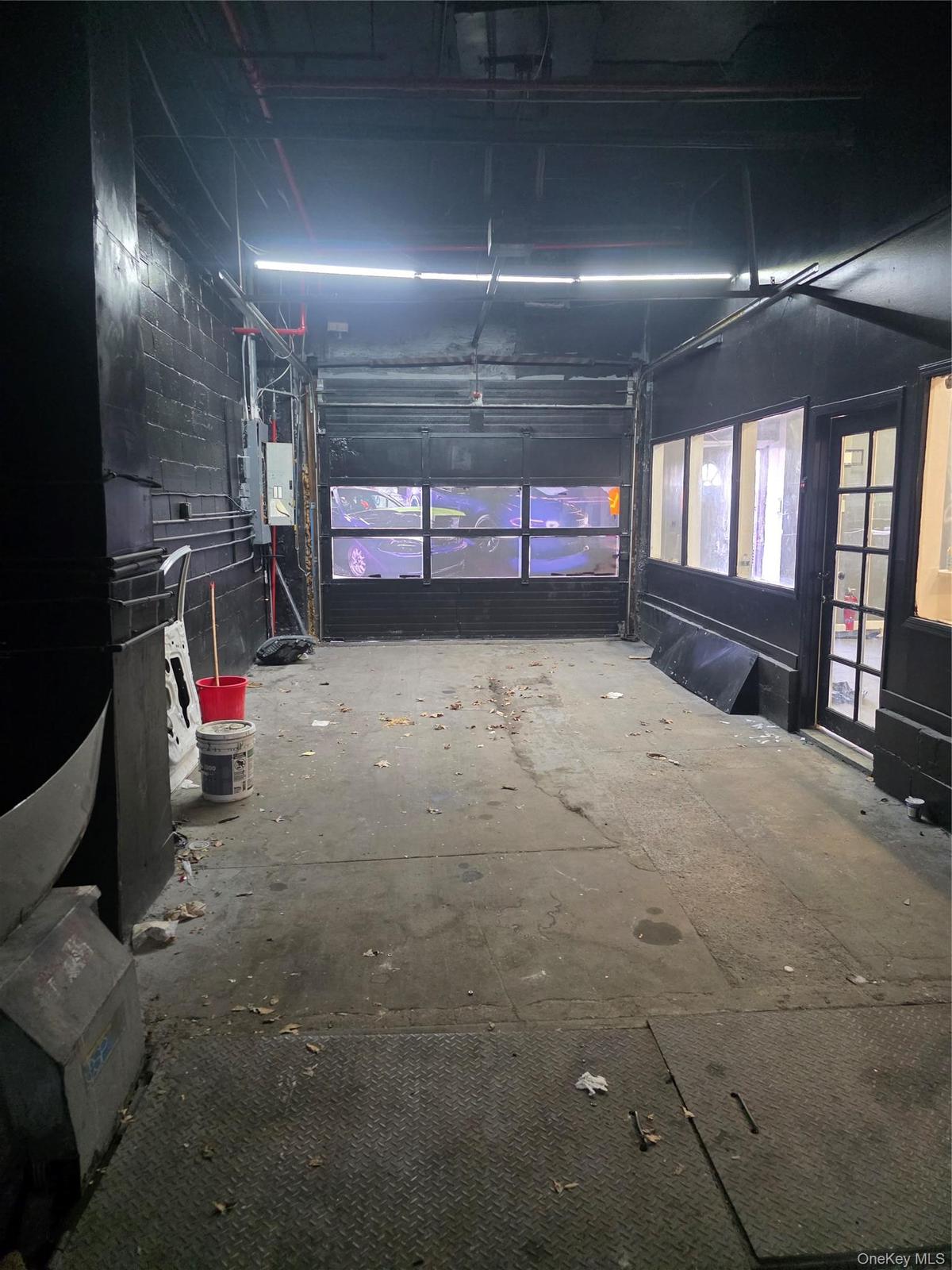 Concrete flooring with diamond plate sections