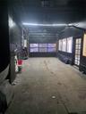Concrete flooring with diamond plate sections