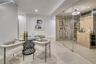 Wine room with recessed lighting and baseboards