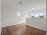 Spacious second-floor landing, ideal for secondary family room, or study lounge