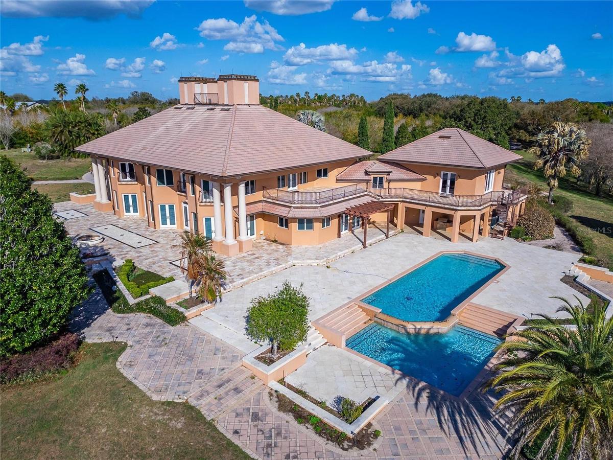 A rare opportunity to own one of Auburndale’s most impressive private estates. Set on 44.30 beautifully landscaped acres with more than 2,300 feet of 