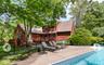 Rear view of property with a patio area and a pool side deck