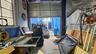 Garage featuring concrete block wall