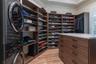 Hi and her closets one equipped with additional laundry