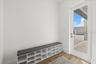 Entry way off the garage has access to the front yard and plenty of room for additional storage or cabinetry.