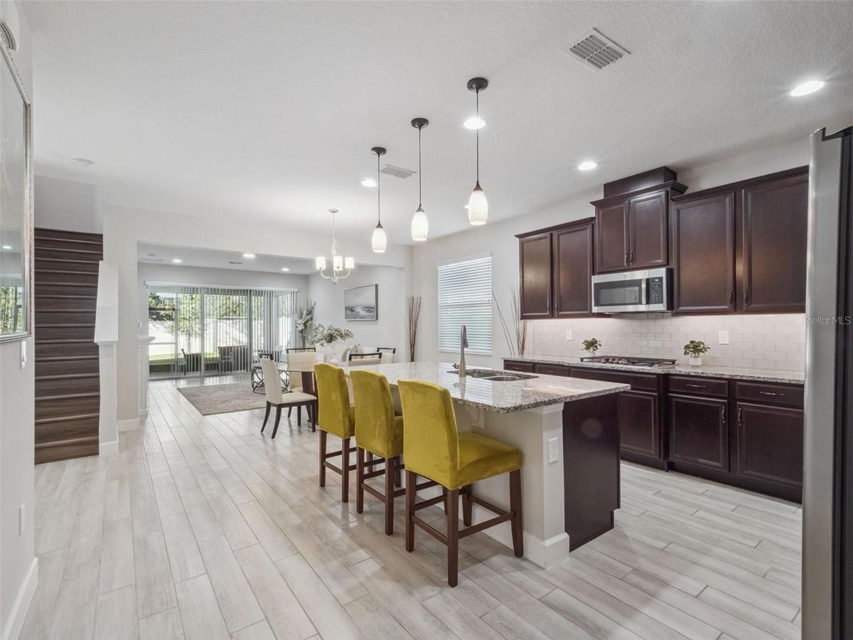 Beyond Foyer - Kitchen, Dining, Living