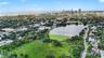Crescent Lake Park’s scenic waterfront, walking paths, and expansive green space are close by, with downtown St. Petersburg rising in the distance.