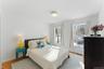 Bedroom featuring  wood finished floors
