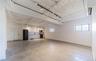 Garage featuring high quality fridge and baseboards