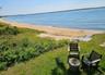 View of water feature with a beach view