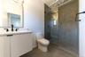 Bathroom with vanity and a stall shower